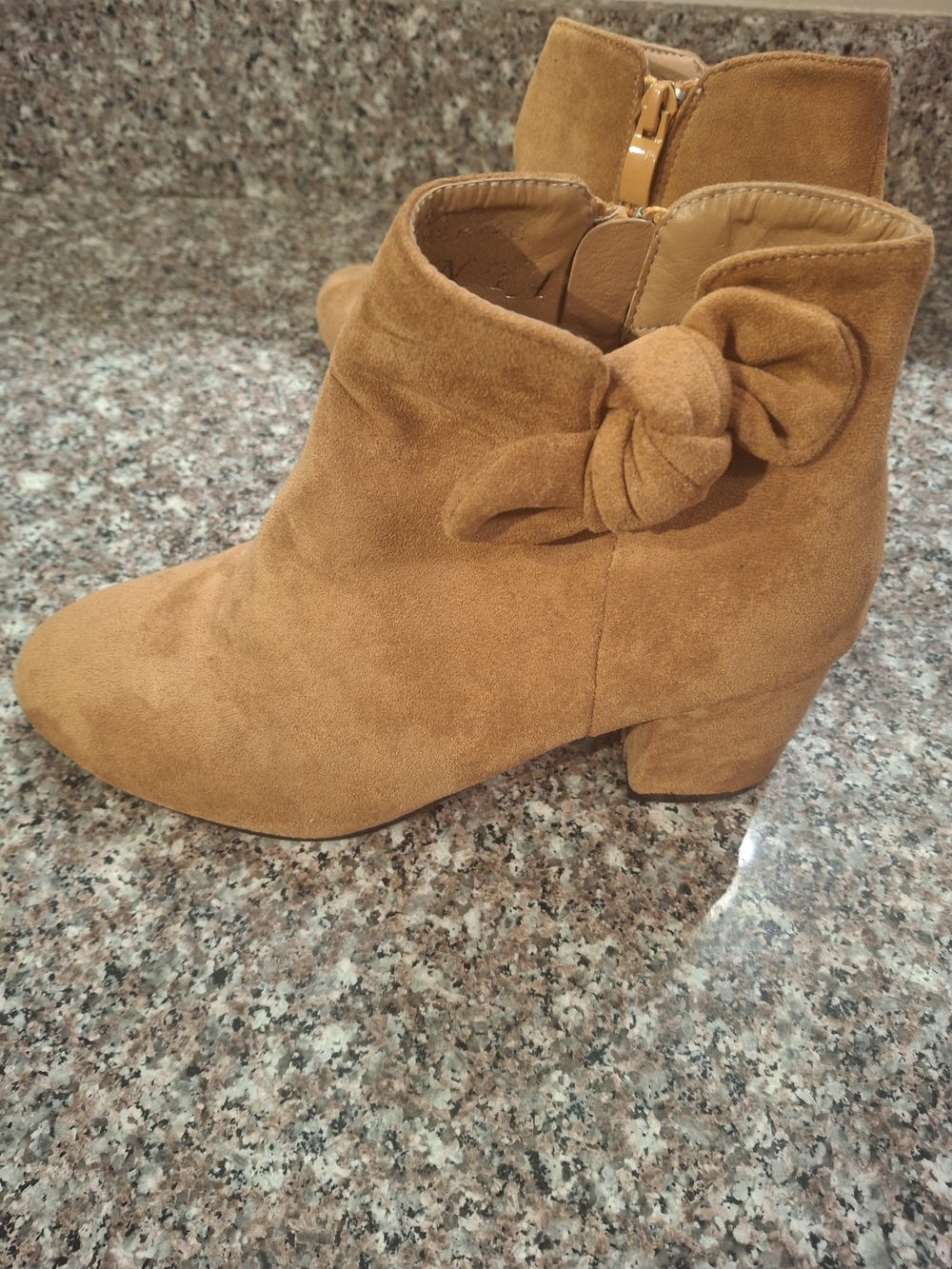 Title:
Tan Suede Ankle Booties with Side Bow Accent - Size 6.5
